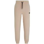 Pantalon BOSS BAS DE SURVÊTEMENT DIMACS BEIGE EN COTON STRETCH À LOGO