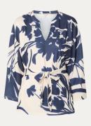 Claudia Sträter Tuniek met bloemenprint en strikceintuur