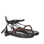 Sandalen in leer met teenstuk en parels