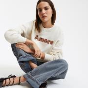 Sweater met ronde hals en geborduurde boodschap, losse pasvorm