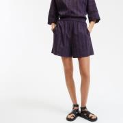 Korte broek in broderie anglaise met elastische tailleband