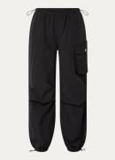 NIKKIE Isra tapered fit trackpants met steekzakken