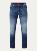 HUGO 734 slim fit jeans met donkere wassing