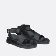 Sandales entre-doigt compensées en cuir à bride